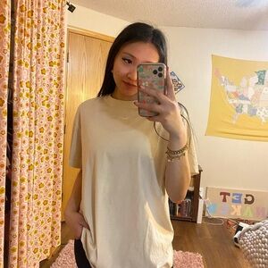 nike phoenix pastel yellow tee